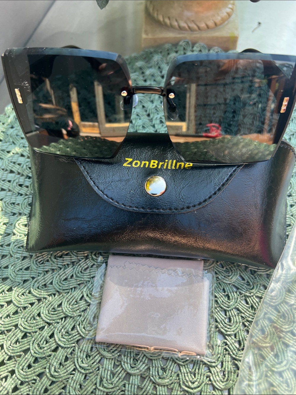 NWOT Black Sunglasses with case Women's Fashion Accessory.